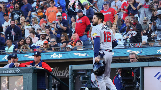 Aug 27, 2023; San Francisco, California, USA; Atlanta Braves catcher Travis d'Arnaud (16) smiles after scoring a run against the San Francisco Giants during the fifth inning at Oracle Park.
